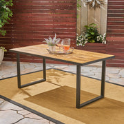 Outdoor teak dining table with U-shaped legs and slat top, by Noble House, ideal for outdoor patio dining.
