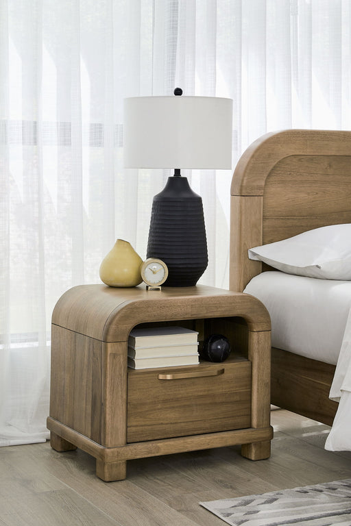 Modus Kione one-drawer acacia wood nightstand in Lioness finish, featuring a sleek design and natural wood grain details.