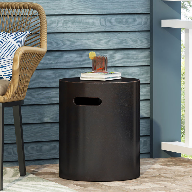 Noble House outdoor copper end table with a cutout handle, featuring a round tabletop and sturdy legs for patio or garden use.