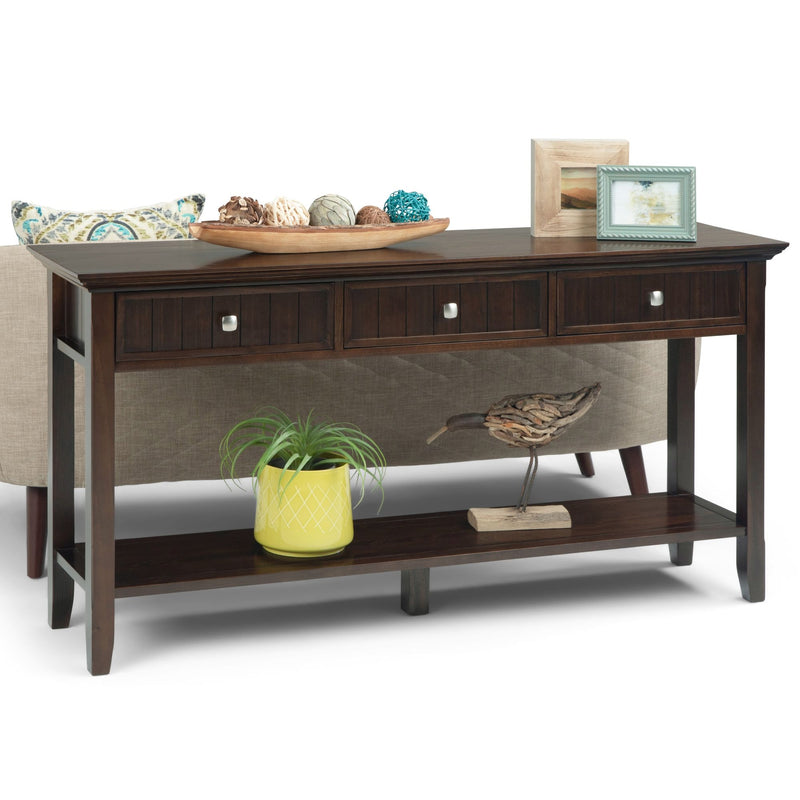 Simpli-Home Acadian wide console sofa table in brunette brown with a sleek, modern design and spacious surface for living room decor.