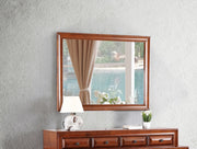 Glory Furniture LaVita mirror with a sleek, modern frame, reflecting a clean, stylish design for contemporary home decor.