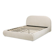 Jennifer Taylor Home Archie Puffy Grounded upholstered platform bed with padded headboard and plush fabric in a modern bedroom setting.