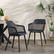 Pair of Noble House Azalea chairs with wooden frames and upholstered seats, shown in a modern living room setting.