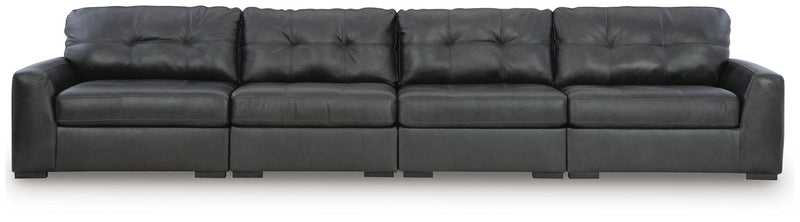 Signature Design by Ashley Brindley Pier sectional sofa with plush cushions and modern design in a spacious living room setting.