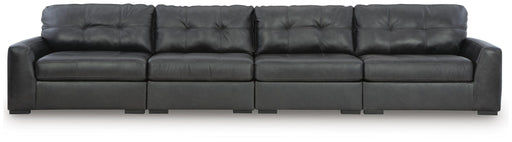 Signature Design by Ashley Brindley Pier sectional sofa with plush cushions and modern design in a spacious living room setting.