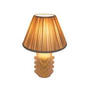 Cream Edith table lamp by TOV Furniture featuring scalloped papier-mâché flower design and pleated fabric shade.
