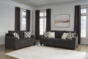 Benchcraft stationary chair and ottoman from Loreo living room set, with plush fabric and modern design.