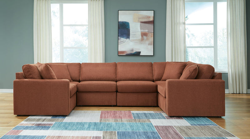 Signature Design by Ashley Modmax Spice stationary sectional sofa with plush cushions and modern design.