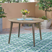 Noble House Stamford outdoor dining table with modern design, featuring a sleek rectangular surface and sturdy legs for outdoor use.
