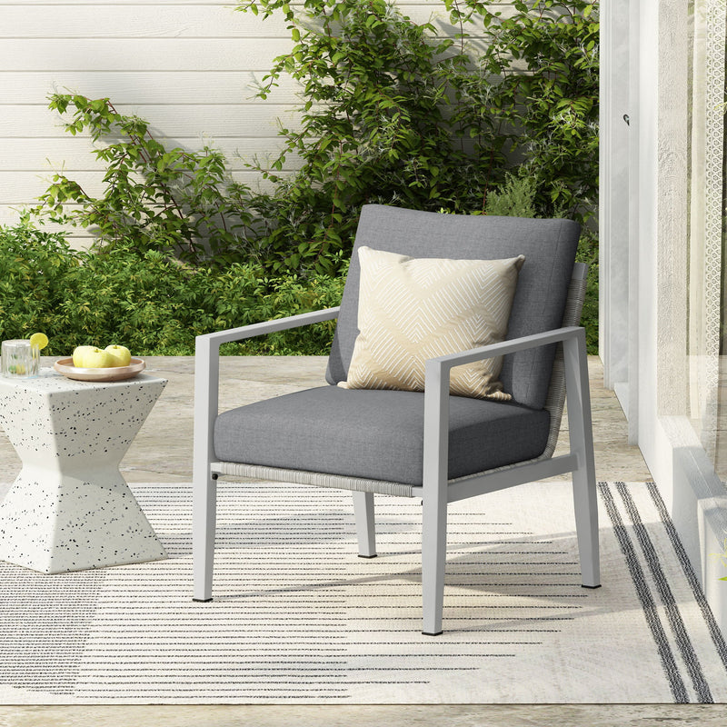 Noble House modern lounge arm chair with rope accents and plush cushions, stylishly designed for contemporary living spaces.