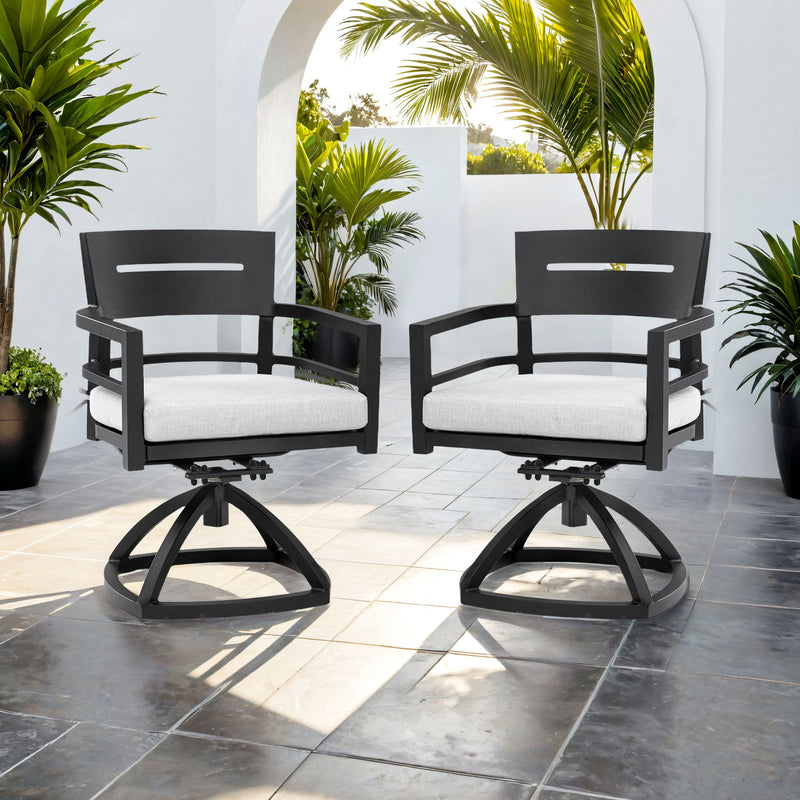 Pair of outdoor patio swivel rocking chairs with black Ember finish and Sunbrella fabric cushions by Life Outside.