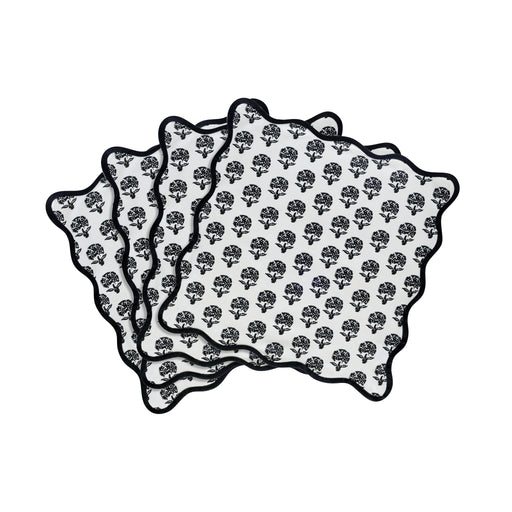 Set of four TOV Furniture Crissy cotton canvas printed napkins with black vintage floral design, ideal for table setting or decor.