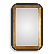 Uttermost Niva metallic wall mirror with a gold finish, showcasing a sleek round design and elegant frame.
