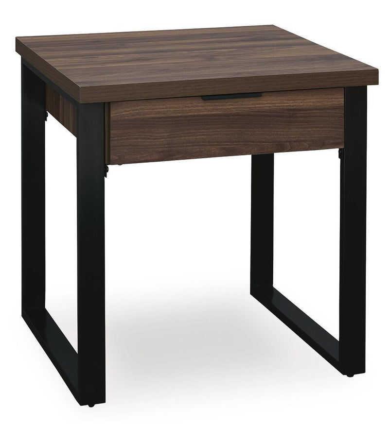 Signature Design by Ashley Wickman Falls rectangular cocktail table with a sleek wooden surface and sturdy metal legs.