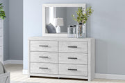 Whitewashed dresser and mirror set by Signature Design by Ashley, featuring a modern, sleek design with ample storage.