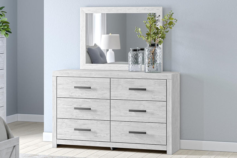 Whitewashed dresser and mirror set by Signature Design by Ashley, featuring a modern, sleek design with ample storage.