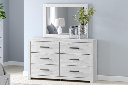 Whitewashed dresser and mirror set by Signature Design by Ashley, featuring a modern, sleek design with ample storage.