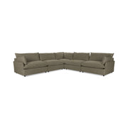 Classic Home Caplan modular sectional sofa with plush cushions and neutral fabric, shown in a modern living room setting.