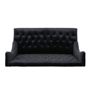 Noble House upholstered loveseat with wingback design, diamond tufting, and plush fabric, perfect for cozy stationary seating.