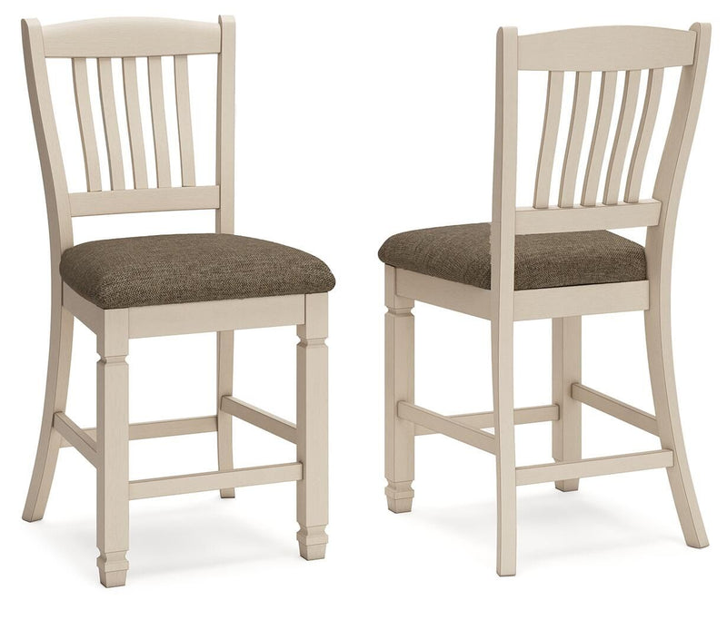 Set of two beige Bolanburg upholstered barstools by Signature Design Ashley featuring cushioned seats and wooden legs.