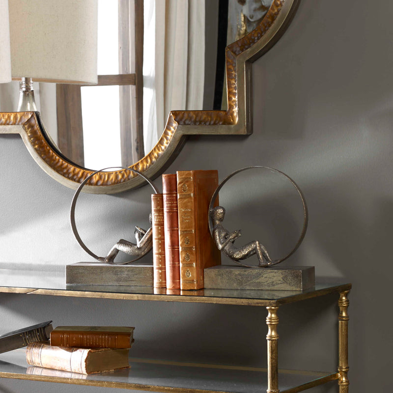 Dark brown Uttermost Lounging Reader antique bookends set of 2, featuring detailed vintage-inspired design for home decor.