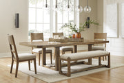 Signature Design by Ashley Cabalynn 6-piece dining room set with a rectangular table and six upholstered chairs in a modern style.