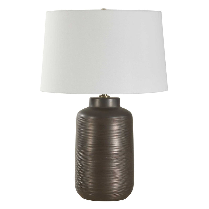 Uttermost Calderone bronze table lamp with a sleek, modern design and a sturdy base, ideal for contemporary home decor.