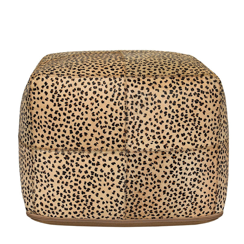 Classic Home hide accent pouf in neutral fabric, round shape with soft cushioning, versatile for living room or lounge decor.