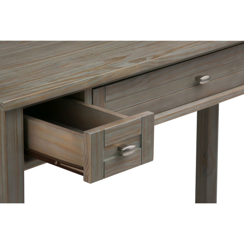 Handcrafted Warm Shaker writing desk by Simpli-Home with a natural wood finish and clean, simple design for home office use.
