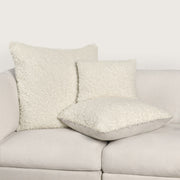 Ivory Carters accent pillow by Classic Home, 22x22 inches, with a soft fabric cover and decorative design.