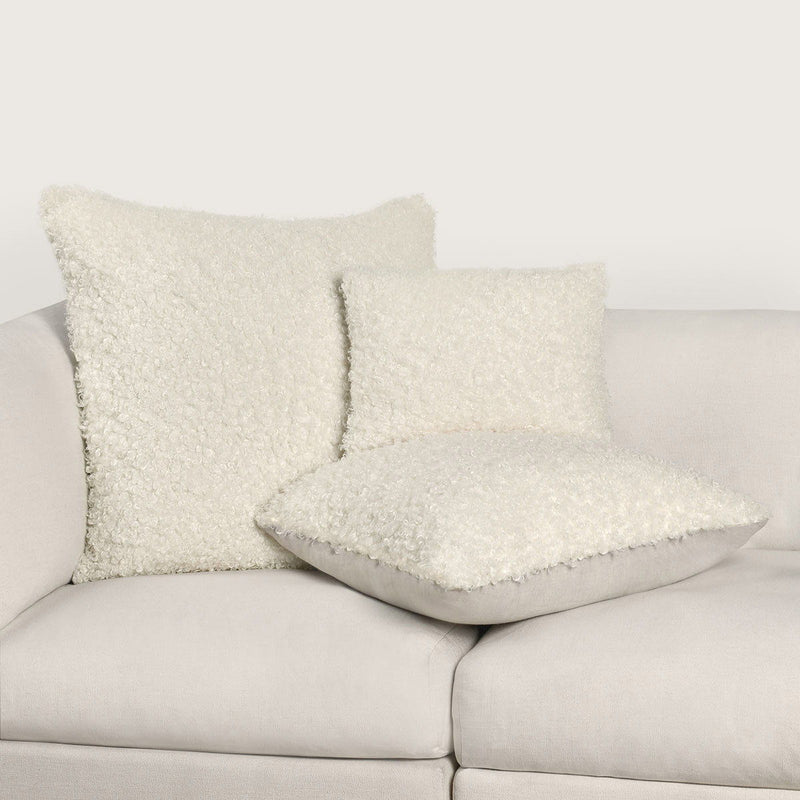 Ivory Carters accent pillow by Classic Home, 22x22 inches, with a soft fabric cover and decorative design.