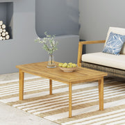 Brown outdoor rectangular coffee table from Noble House, featuring a sturdy wood design for patio or garden use.