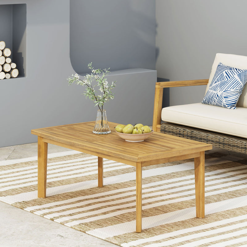 Brown outdoor rectangular coffee table from Noble House, featuring a sturdy wood design for patio or garden use.