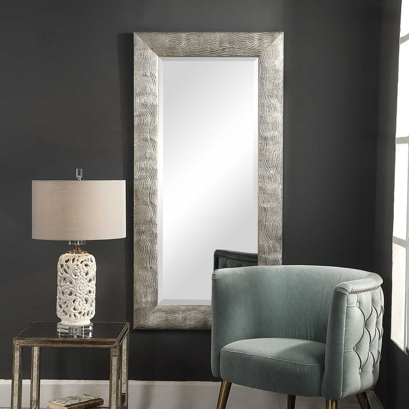 Silver Maeona metallic wall mirror by Uttermost featuring a sleek, modern round design with a reflective silver finish.
