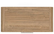 Warm natural brown five-drawer accent chest by Signature Design by Ashley, showing the wooden chest with sleek drawer handles.