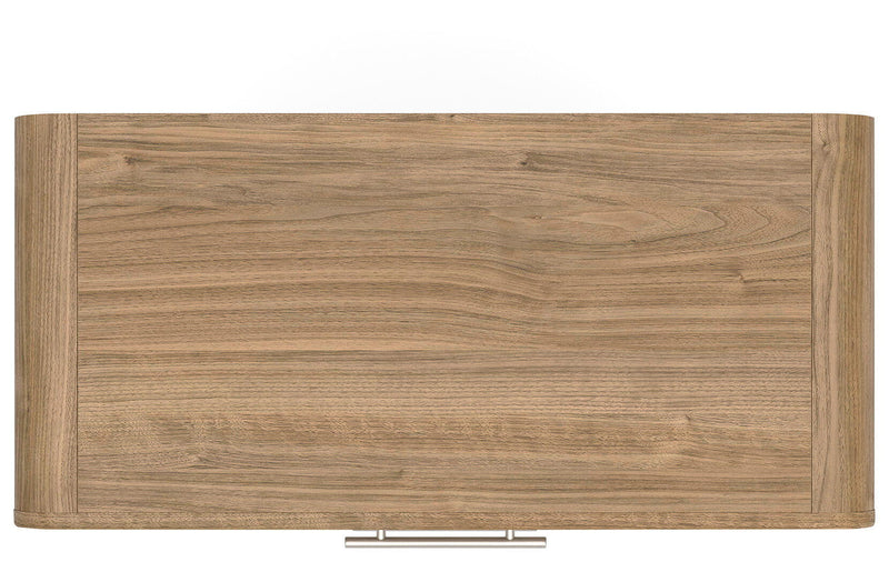 Warm natural brown five-drawer accent chest by Signature Design by Ashley, showing the wooden chest with sleek drawer handles.