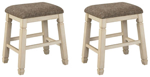 Set of two beige upholstered stools by Signature Design by Ashley, featuring cushioned seats and wooden legs.