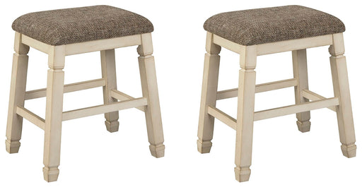 Set of two beige upholstered stools by Signature Design by Ashley, featuring cushioned seats and wooden legs.
