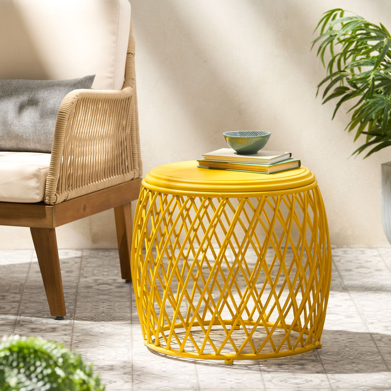 Noble House Alamera side table with wooden finish and modern design, featuring a round top and sleek legs.