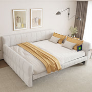 Dreamland upholstered storage platform bed with built-in USB charging ports, featuring a padded headboard and sleek design.