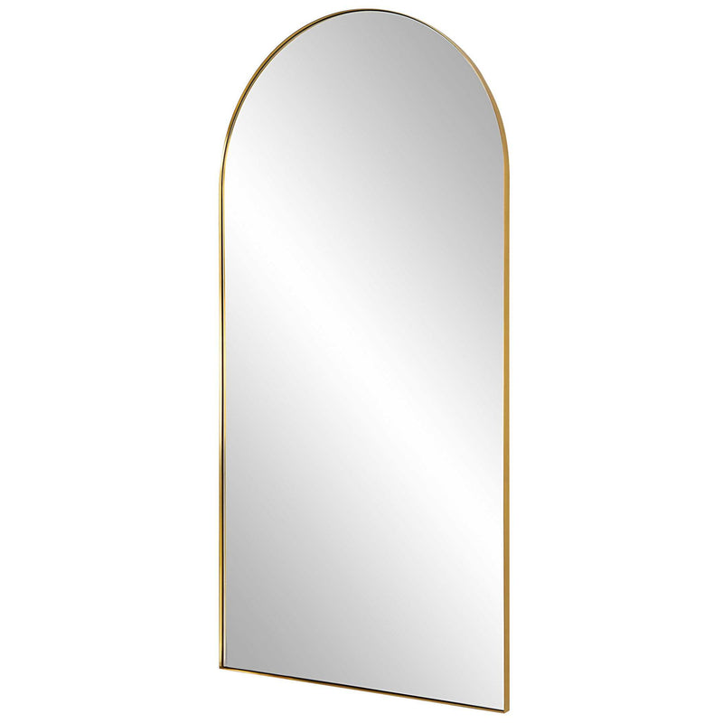 Uttermost Crosley Arch Mirror with antique brass finish, wall-mounted design featuring a sleek, curved frame and reflective glass surface.