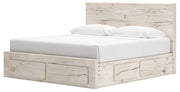 Signature Design by Ashley Lawroy panel bed with built-in storage drawers, showcasing a modern wooden bedroom furniture piece.