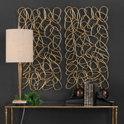 Uttermost In The Loop gold wall art set of 2, modern wall decor with circular loop design, suitable for contemporary interiors.