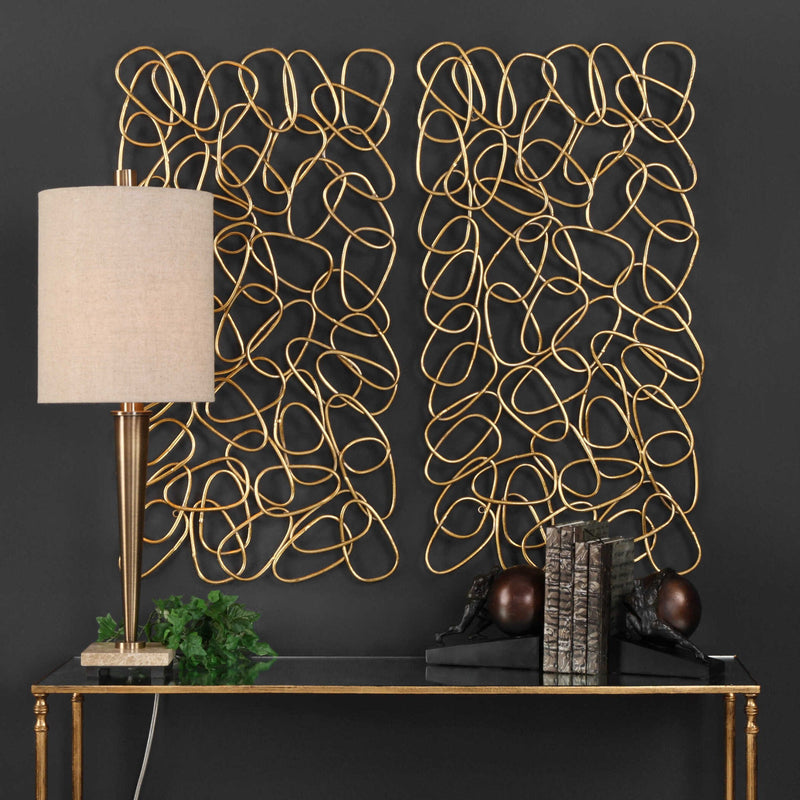 Uttermost In The Loop gold wall art set of 2, modern wall decor with circular loop design, suitable for contemporary interiors.