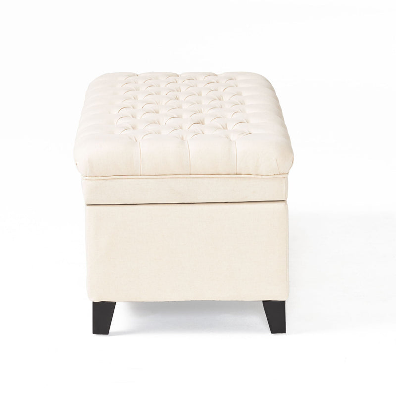 Noble House Juliana storage ottoman with birch wood legs, upholstered in neutral fabric, showcasing a functional and stylish design.