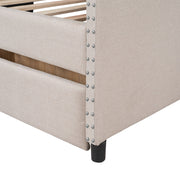 DreamHaus upholstered daybed with wood slat support and two storage drawers, showcasing a cozy, modern design in a bedroom setting.