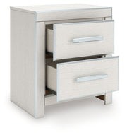 Zuraleus - Two Drawer Night Stand - R&R Furniture Gallery (Fountain Valley, CA)