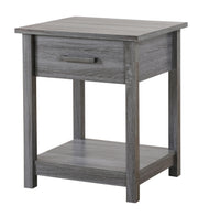 Glory Furniture Salem accent nightstand with a dark wood finish and a single drawer, placed beside a bed in a modern bedroom setting.