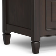 Simpli-Home Connaught storage bench with cushioned top and wooden base, ideal for entryway or living room seating and storage.