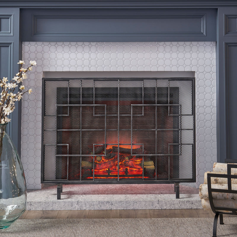Modern single panel iron fireplace screen with decorative design, by Noble House, designed to protect and enhance fireplace safety.